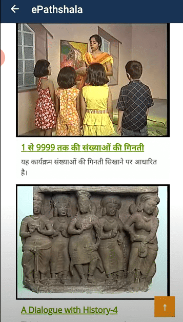 A group of children and a person standing in front of a statueDescription automatically generated with low confidence